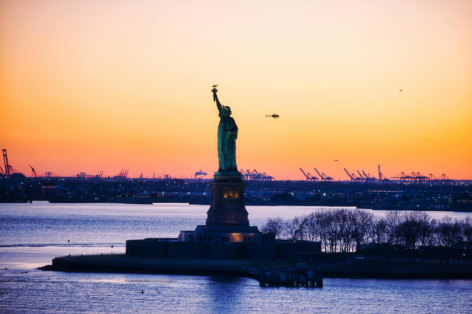 Statue of Liberty sunset view from harbor cruise