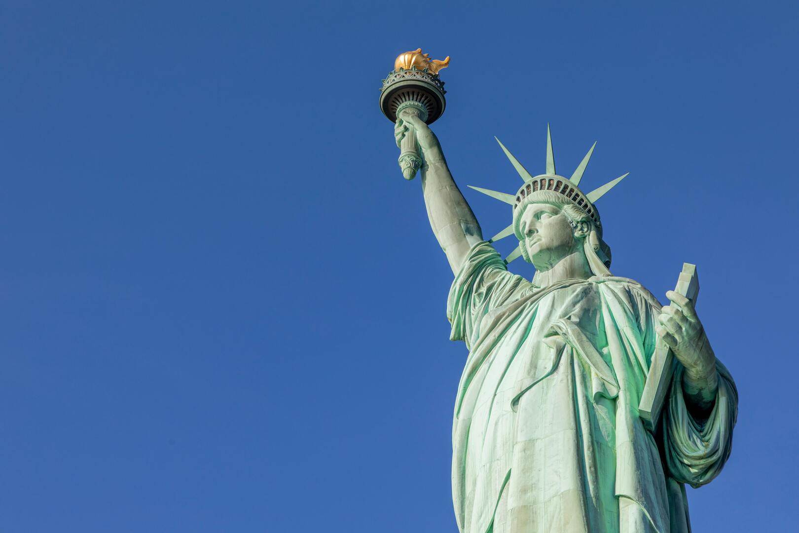 Statue of Liberty view with New York Harbor and Manhattan skyline